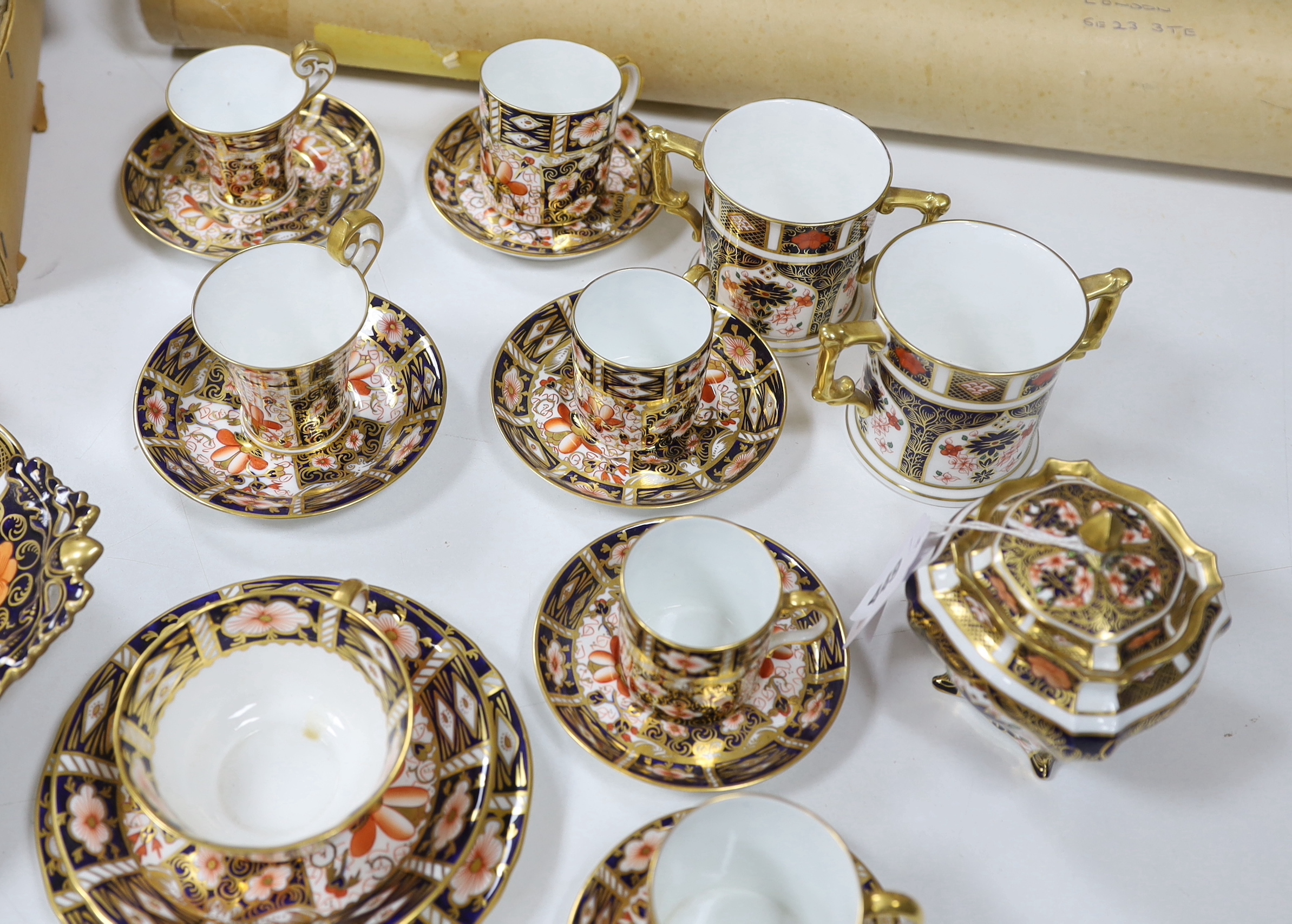 A collection of Royal Crown Derby Imari porcelain, largest 27cm in diameter